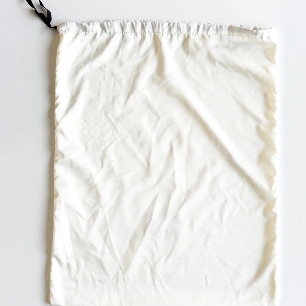 Gucci Ivory Storage Bag with Black Tie